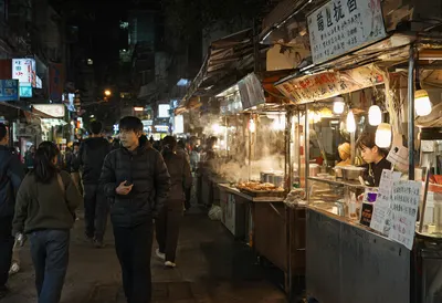 Busy Asian Night Market with Street Food Stalls (AI-generated)
