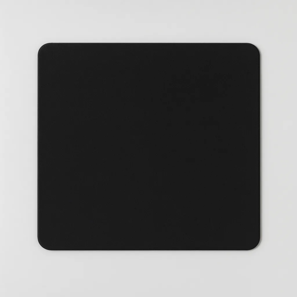 Plain black square mouse pad with rounded corners viewed from above on a light gray background. (AI-generated)