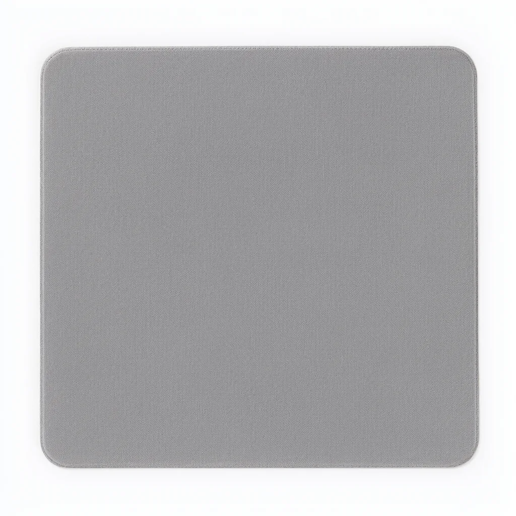 Rectangular gray fabric mouse pad with rounded corners on a white background. (AI-generated)