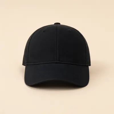 Black Baseball Cap on Beige Background