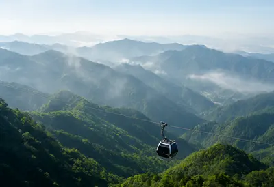 Cable Car Flying over Lush Green Mountain Valleys (AI-generated)