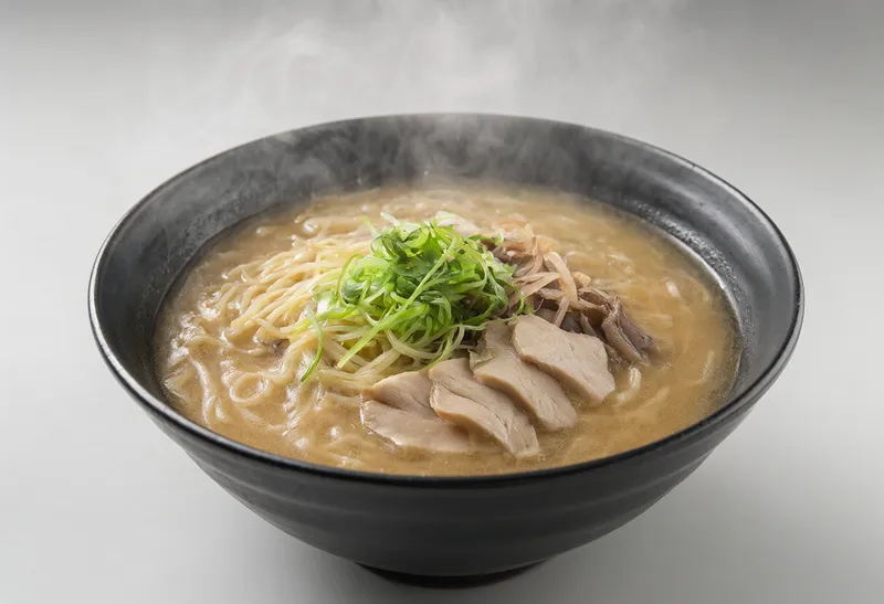 Japanese ramen bowl in warm studio lighting (AI-generated)