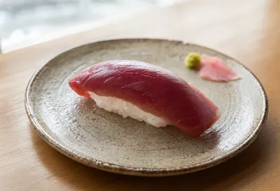 Fresh Tuna Nigiri Sushi on a Ceramic Plate (AI-generated)