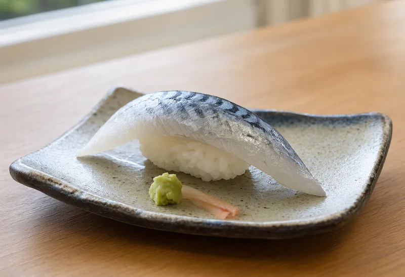 Fresh mackerel nigiri sushi on a handcrafted ceramic plate (AI-generated)