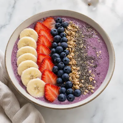 Berry Smoothie Bowl with Granola and Banana (AI-generated)