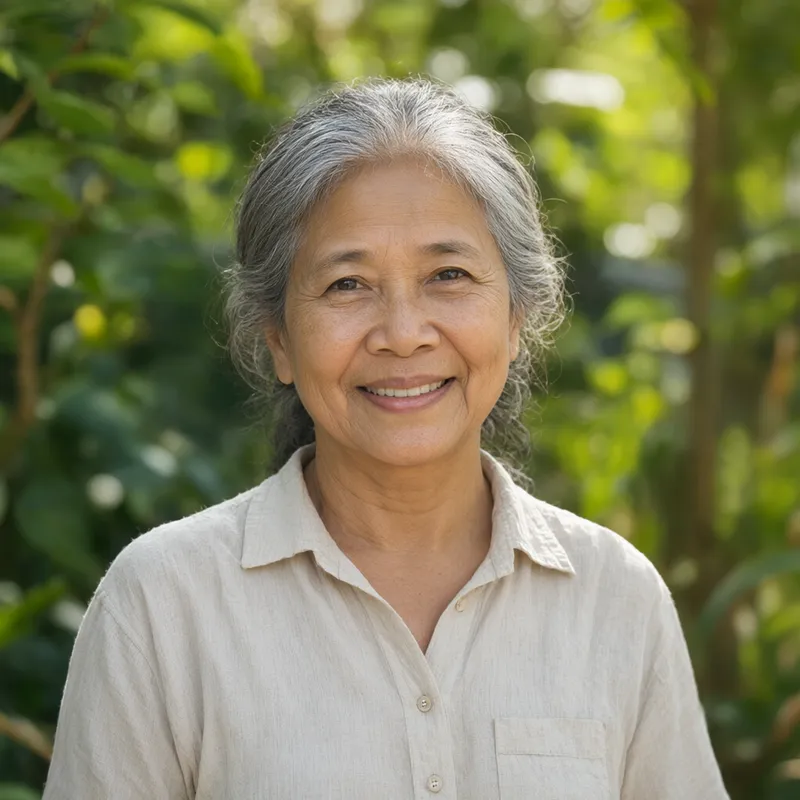 Friendly senior woman smiling in a sunlit garden (AI-generated)