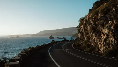 Scenic Coastal Road Along Cliffs (AI-generated)