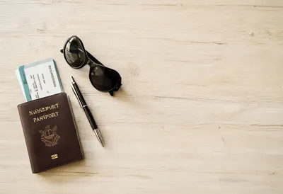 Passport and Boarding Pass Flat Lay (AI-generated)