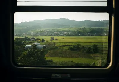 Train Window View of the Countryside (AI-generated)