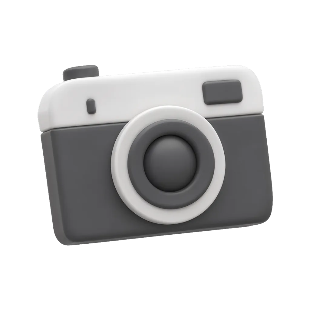 3D clay icon of a chunky clay camera in charcoal and white