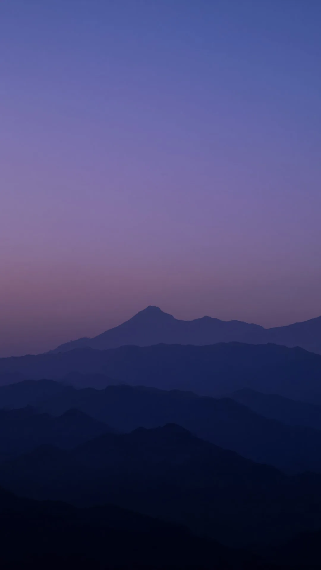 Mountain Silhouette Layers at Dusk