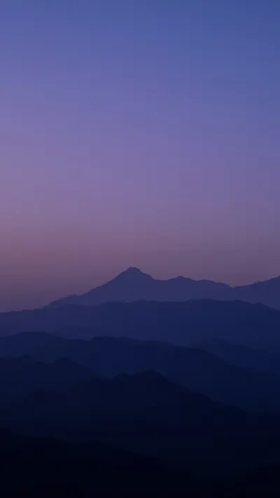 Mountain Silhouette Layers at Dusk