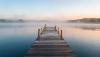 Misty Lake with a Wooden Jetty