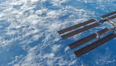 Space Station Orbit over Clouds