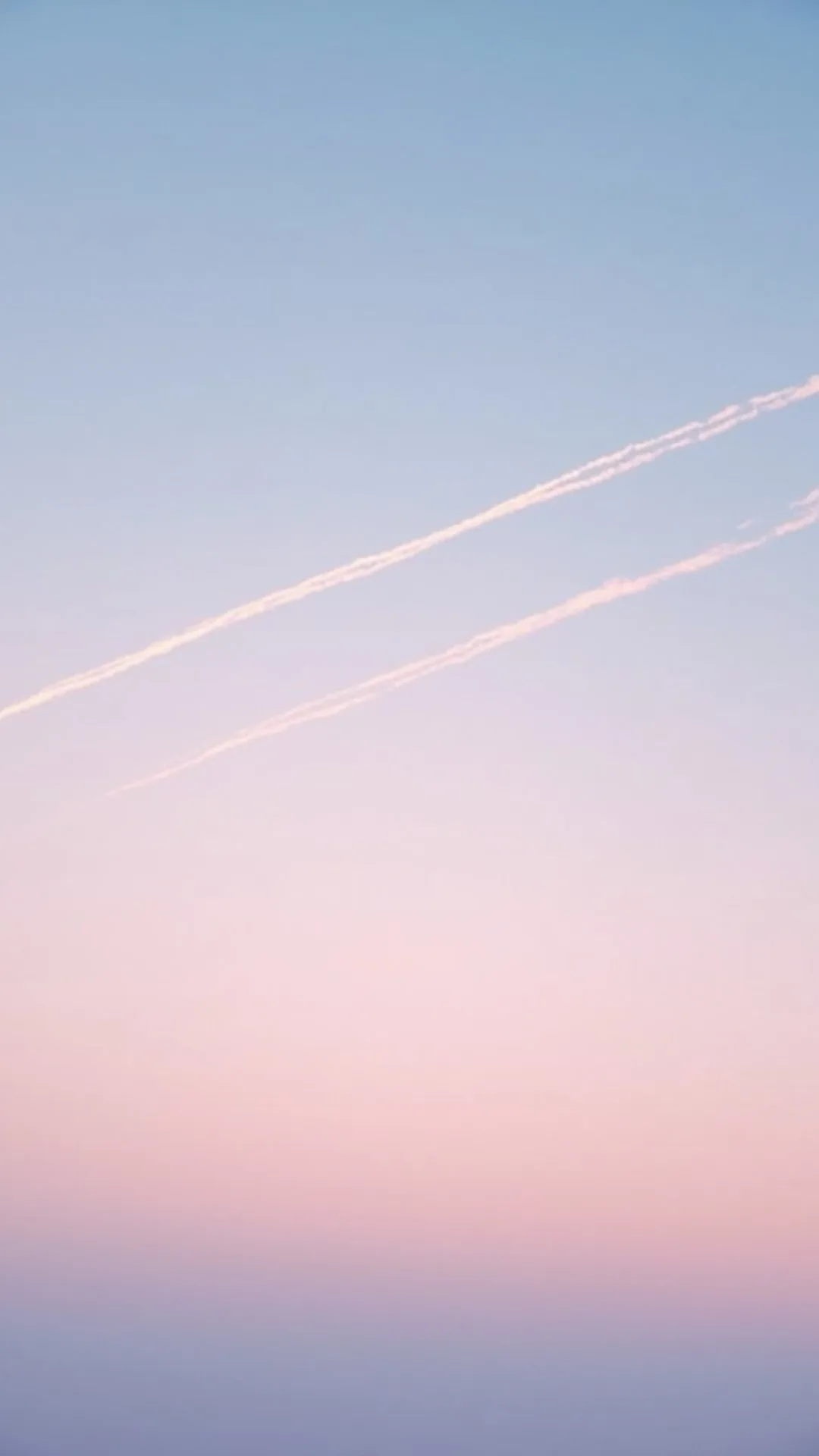 Vapor Trails in a Pastel Sky