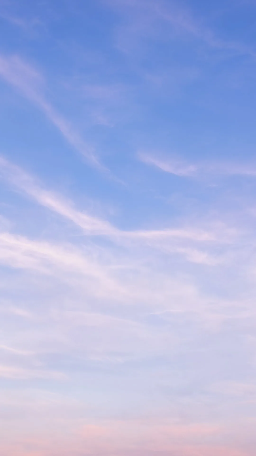 Pastel Sky with Thin Clouds