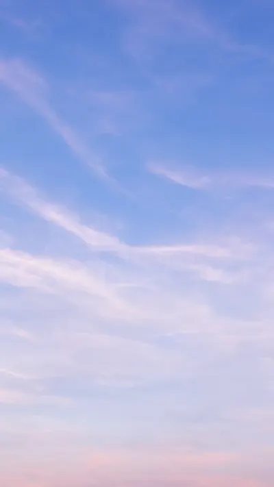 Pastel Sky with Thin Clouds