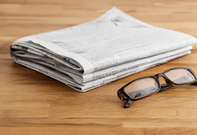 Business Newspaper and Glasses