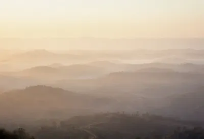 Misty Valley at Sunrise