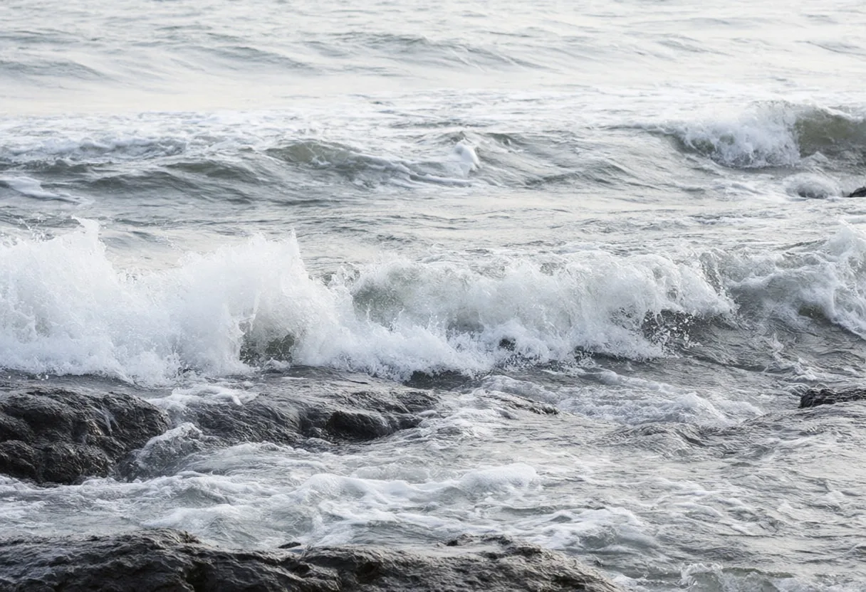 Ocean Waves on Dark Rocks