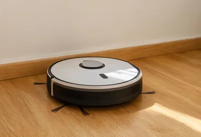 Robot Vacuum on a Wooden Floor
