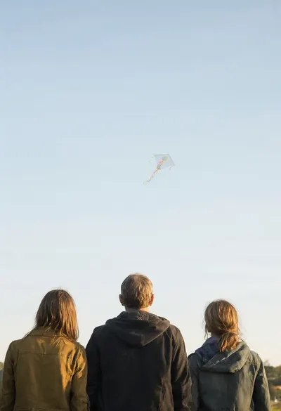 Family Watching a Kite
