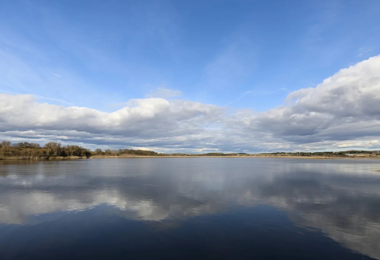 Still Lake Reflection under a dramatic sky