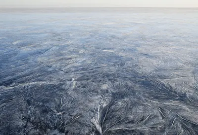 Frost Patterns On Lake Ice in warm summer light
