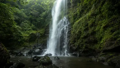 Waterfall In A Green Valley with a minimal touch