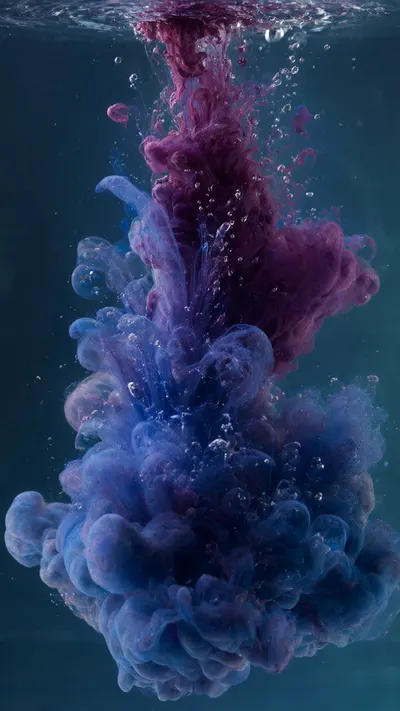 Ink Dispersing In Water in a deep palette