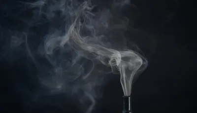 Soft Smoke Wisps On A Dark Background in a soft palette