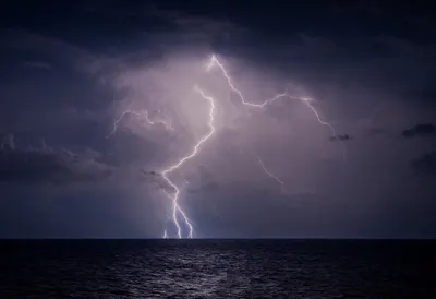 Lightning over a Stormy Sea at Night