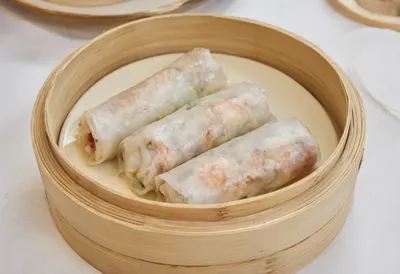 Chinese Three spring rolls cut in half on a plate