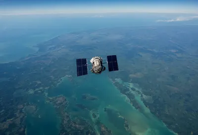 Satellite over a Coastline from Orbit