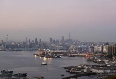 Harbour Skyline At Dusk Seen From Far Away