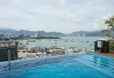 Rooftop Pool Overlooking A Bay on a quiet day