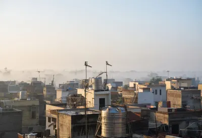 Rooftops in Morning Mist