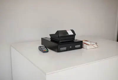 Shop Counter with a Till in a minimal setting
