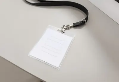 Conference Badge on a Table in a minimal setting