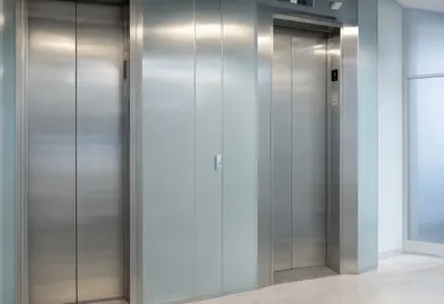 Elevator Lobby in Brushed Metal with cool clean light