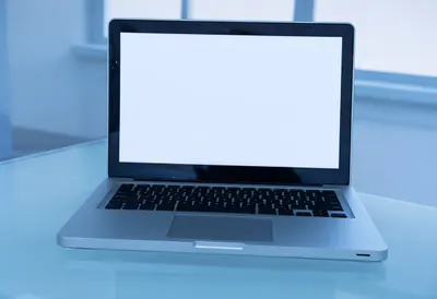 Laptop on a Glass Desk