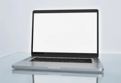 Laptop on a Glass Desk with soft rim light