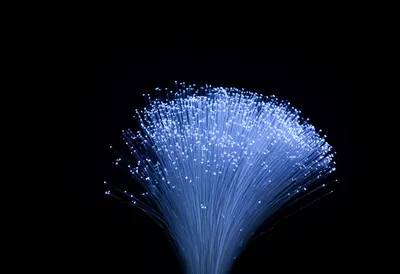 Fibre Optic Strands Glowing with cool blue light