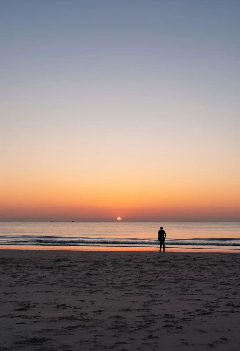Silhouette on a Beach at Sunset at dusk