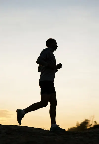 Runner Silhouette at Dawn at golden hour