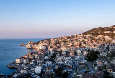 Coastal Town On A Hillside At Dusk