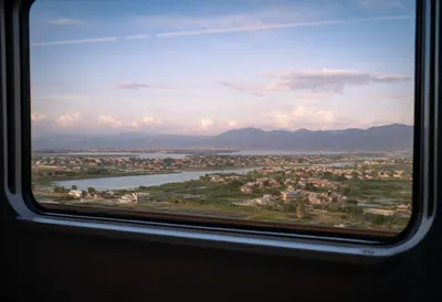 Train Window With A Landscape Passing By
