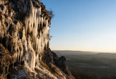 Icicles On A Cliff at golden hour