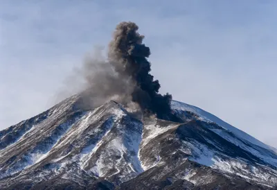 Ash Column over Snowy Slopes