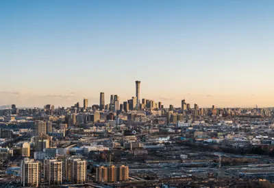 Distant skyline at golden hour, wide angle